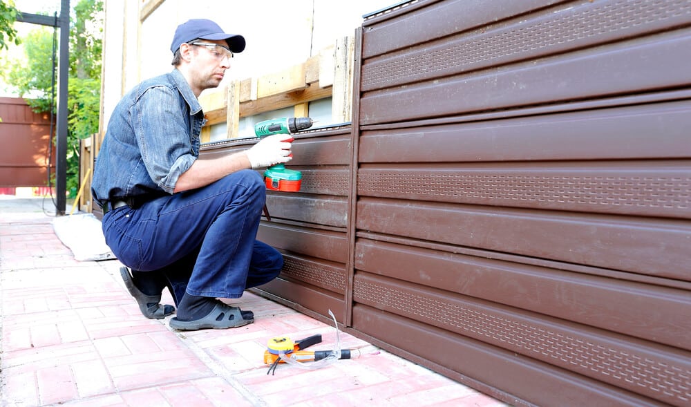 Siding Installer working on installation